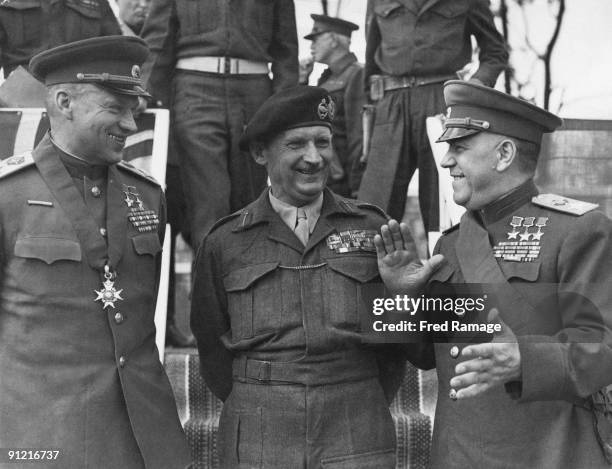 Russian Marshals Konstantin Rokossovsky and Georgy Zhukov wearing their new medals after being formally presented with the KCB and GCB respectively...