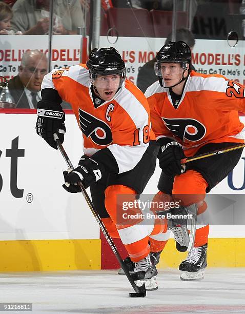 Mike Richards of the Philadelphia Flyers skates against the Detroit Red Wings during preseason action at the Wachovia Center on September 22, 2009 in...