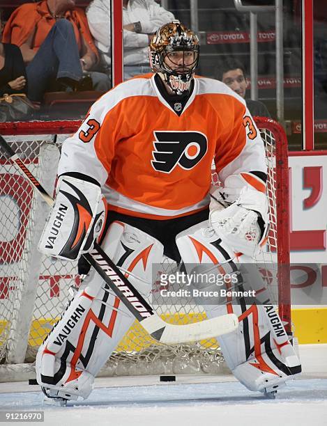 Brian Boucher of the Philadelphia Flyers tends net in warmups prior to his game against the Detroit Red Wings during preseason action at the Wachovia...