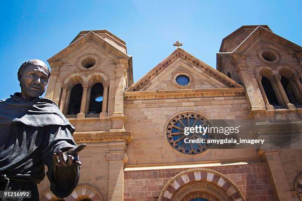 cathedral and saint francis statue - saint francis of assisi stock pictures, royalty-free photos & images