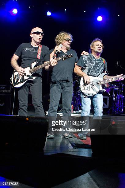 Guitarist Joe Satriani, vocalist Sammy Hagar and bassist Michael Anthony of Chickenfoot perform at the Gibson Amphitheatre on September 27, 2009 in...