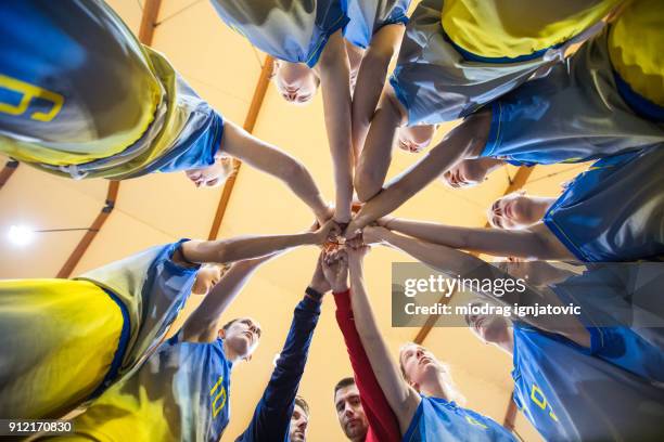 there is no "i" in team! - college athlete stock pictures, royalty-free photos & images