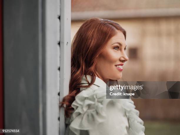 beautiful happy woman outdoors during day in early spring - ambient light stock pictures, royalty-free photos & images