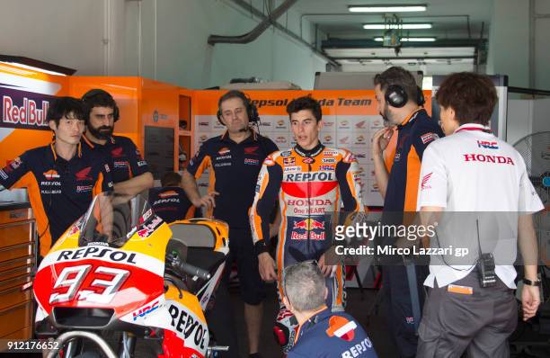Marc Marquez of Spain and Repsol Honda Team looks on near the bike in the pit during the MotoGP test in Sepang at Sepang Circuit on January 30, 2018...