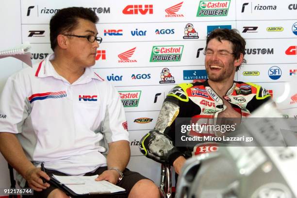 Cal Crutchlow of Great Britain and LCR Honda smiles in the pit during the MotoGP test in Sepang at Sepang Circuit on January 30, 2018 in Kuala...