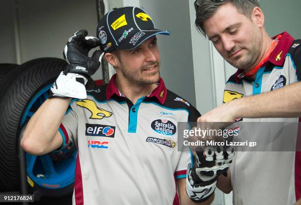 Tom Luthi of Switzerland and and Team EG 0,0 Marc VDS at work in the pit during the MotoGP test in Sepang at Sepang Circuit on January 30, 2018 in...