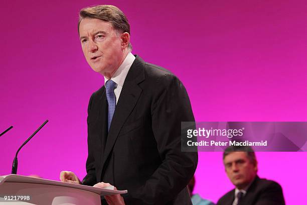 Business Secretary Lord Mandelson is watched by Prime Minister Gordon Brown as he speaks at The Labour Party Conference on September 28, 2009 in...