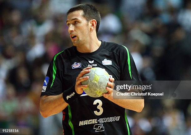 Ferenc Ilyes of Lemgo passes the ball during the Toyota Handball Bundesliga match between HSG Wetzlar and TBV Lemgo at the Rittal Arena on September...