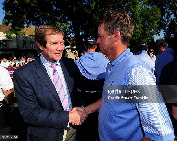 George O'Grady the Chief Executive of the European Tour shakes hands with Anders Hansen of the Continental Europe team after the final day singles...