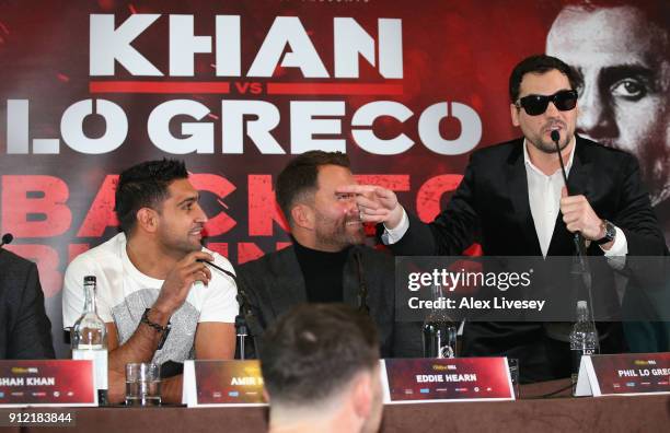 Phil Lo Greco gestures towards Amir Khan during an Amir Khan and Phil Lo Greco press conference at the Hilton Hotel on January 30, 2018 in Liverpool,...