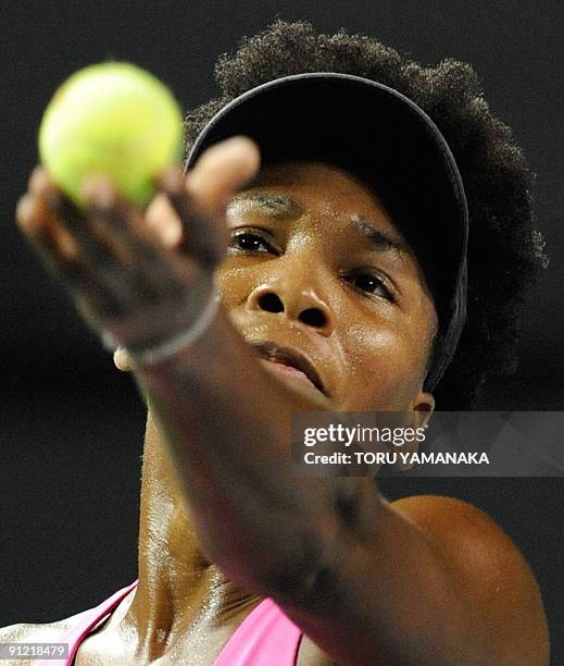 Venus Williams of the USA keeps her eyes on the ball to serve against Anastasia Pavlyuchenkova of Russia during the second round match in the Pan...