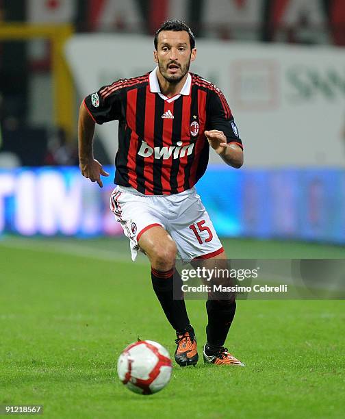 Gianluca Zambrotta of AC Milan in action during the Serie A match between AC Milan and AS Bari at Stadio Giuseppe Meazza on September 27, 2009 in...