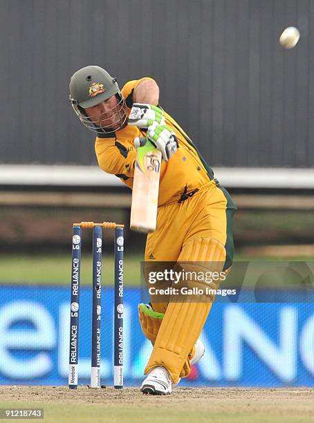 Ricky Ponting of Australia hits a six off Harbhajan Singh of India during the ICC Champions Trophy match between Australia and India played at...