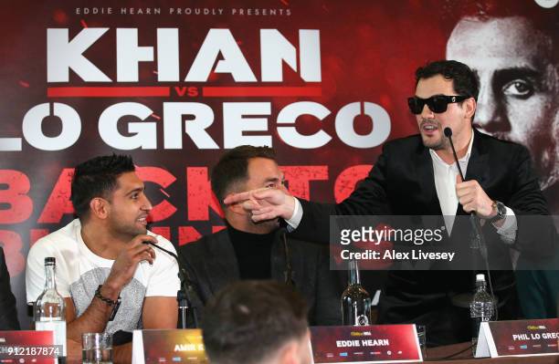 Phil Lo Greco gestures towards Amir Khan during an Amir Khan and Phil Lo Greco press conference at the Hilton Hotel on January 30, 2018 in Liverpool,...