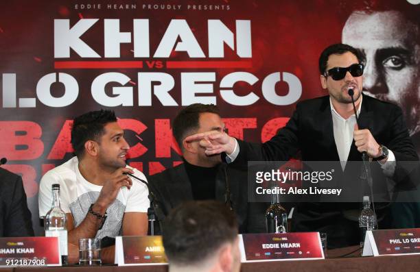Phil Lo Greco gestures towards Amir Khan during an Amir Khan and Phil Lo Greco press conference at the Hilton Hotel on January 30, 2018 in Liverpool,...
