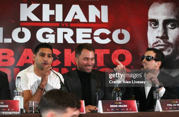 Phil Lo Greco gestures towards Amir Khan during an Amir Khan and Phil Lo Greco press conference at the Hilton Hotel on January 30, 2018 in Liverpool,...