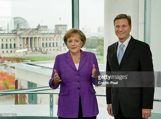 German Chancellor and Chairwoman of the Christian Democratic Union political party Angela Merkel and Guido Westerwelle, party leader of the Free...