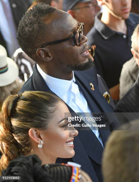 Miss Universe Demi-Leigh Nel-Peters and Usain Bolt during the 2018 Sun Met at Kenilworth Racecourse on January 27, 2018 in Cape Town, South Africa....