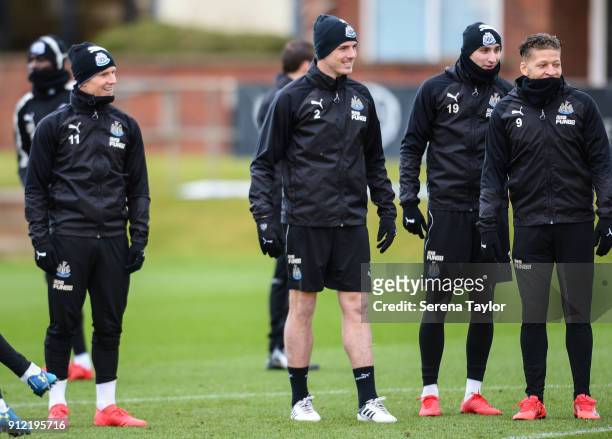 Newcastle players seen L-R Matt Ritchie, Ciaran Clark, Jonjo Shelvey and Dwight Gayle smile during The Newcastle United Training session at The...