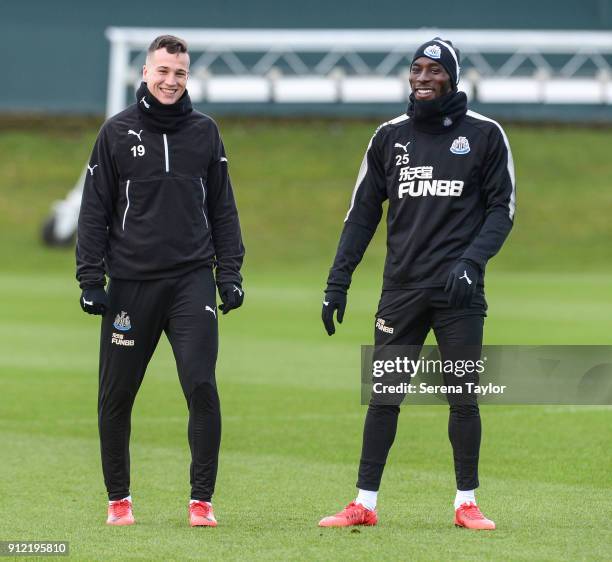 Javier Manquilo and Massadio Haidara smiles during The Newcastle United Training session at The Newcastle United Training Centre on January 30 in...