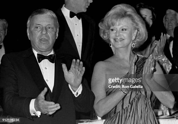 Frank Sinatra and Barbara Sinatra attend Friar's Club "Man of the Year" Honoring Roger Moore on May 17, 1986 at the Waldorf Hotel in New York City.