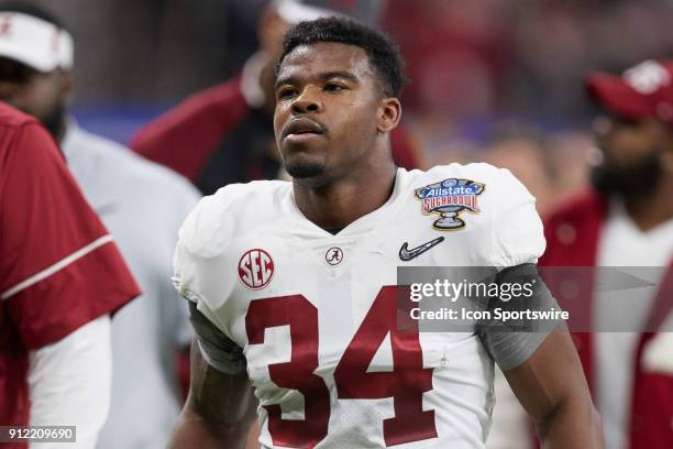 Alabama Crimson Tide running back Damien Harris looks on during the College Football Playoff Semifinal at the Allstate Sugar Bowl between the Alabama...