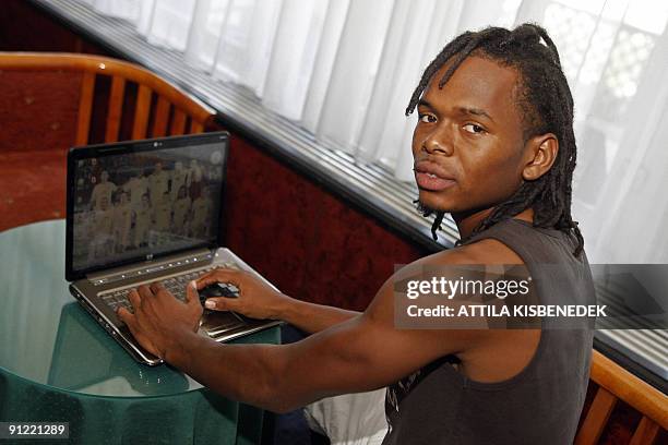 Recent picture taken on September 1, 2009 showing Honduran player of Hungarian VSC Debrecen Luis Ramos sitting in front of his computer in a local...