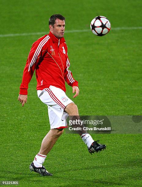 Jamie Carragher of Liverpool in action during a training session prior to the UEFA Champions League Group E match between Fiorentina and Liverpool at...