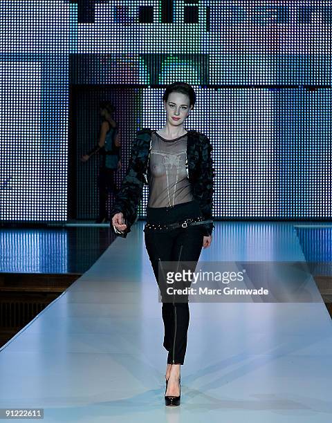 Model showcases designs by Tulipani on the catwalk at the Mercedes-Benz Group Show 5 as part of Mercedes-Benz Fashion Festival Brisbane 2009 at...