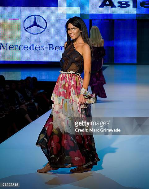 Model showcases designs by Katelyn Aslett on the catwalk at the The Sunday Mail Group Show as part of Mercedes-Benz Fashion Festival Brisbane 2009 at...