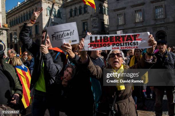 Demonstrators take part in a protest to support former Catalan President, Carles Puigdemont on January 30, 2018 in Barcelona, Spain. The President of...