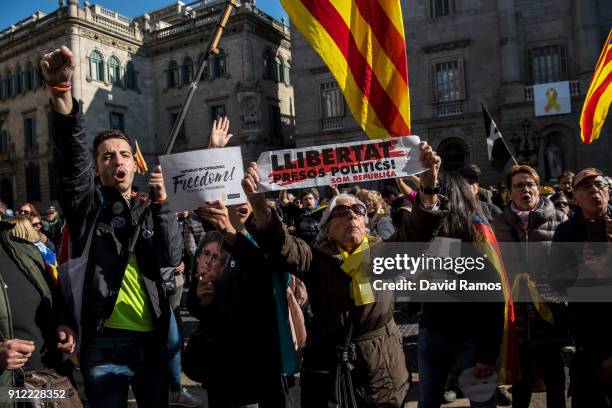 Demonstrators take part in a protest to support former Catalan President, Carles Puigdemont on January 30, 2018 in Barcelona, Spain. The President of...