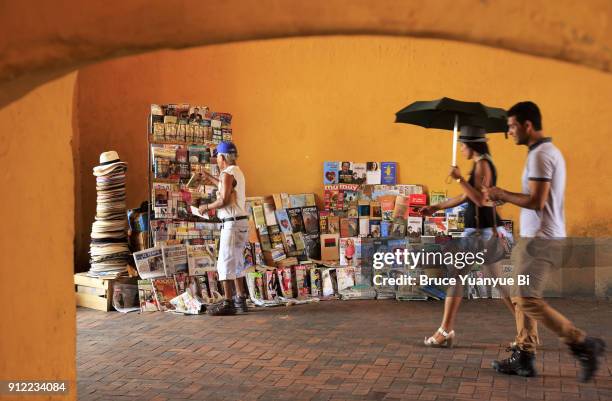 newspaper and magazine vendor in puerta del roloj - plaza de los coches stock pictures, royalty-free photos & images