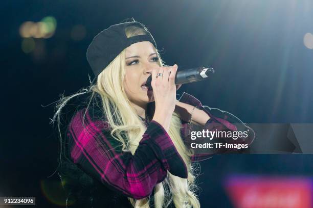 Mia Julia Brueckner sings during the JOKA Biathlon World Team Challenge at Veltins-Arena on December 28, 2017 in Gelsenkirchen, Germany.