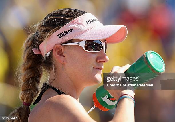 Kerri Walsh of USA sprays herself with water before the gold medal match against Brazil in the AVP Crocs Tour World Challenge at the Westgate City...