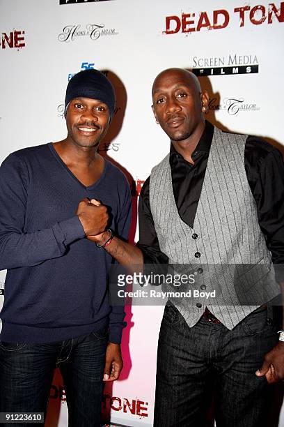September 03: Actor Brian Hooks and former NBA basketball star Bobby Jackson poses on the red carpet at the "Dead Tone" movie premiere at Chatham's...