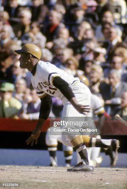 S: Outfielder Roberto Clemente Pittsburgh Pirates swings and watches the flight of his ball during a MLB baseball game circa early 1970's at Three...