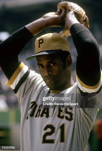 Outfielder Roberto Clemente Pittsburgh Pirates warms up before a MLB baseball game circa early 1970's. Clemente' Played for the Pirates from 1955-72.
