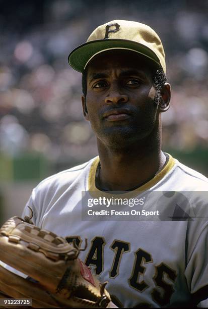 Outfielder Roberto Clemente Pittsburgh Pirates warms up before a MLB baseball game circa early 1970's. Clemente' Played for the Pirates from 1955-72.