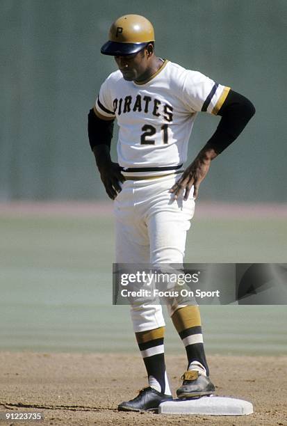 S: Outfielder Roberto Clemente Pittsburgh Pirates standing on second base during a MLB baseball game circa early 1970's at Three Riverfront Stadium...