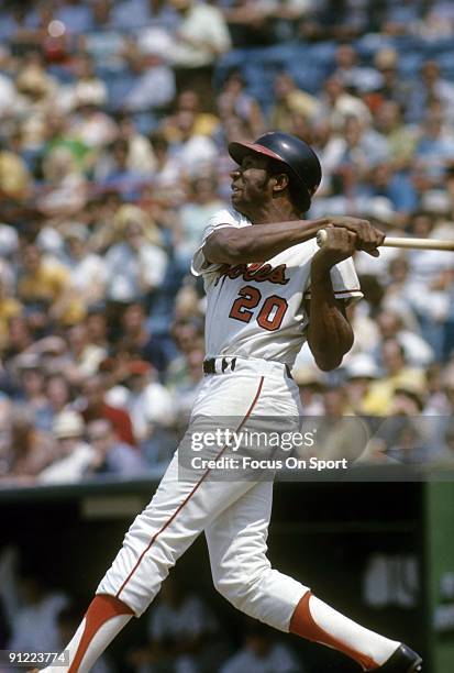 S: Outfielder Frank Robinson of the Baltimore Orioles swings and watches the flight of his ball during a circa late 1960's Major League Baseball game...