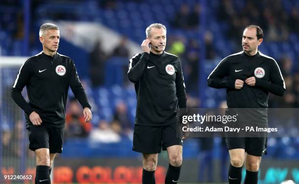 Match referee Martin Atkinson and assistant referees Stephen Child and Peter Kirkup