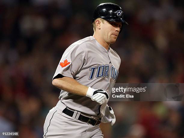 Aaron Hill of the Toronto Blue Jays rounds first base after his solo home run in the first inning against the Boston Red Sox on September 28, 2009 at...
