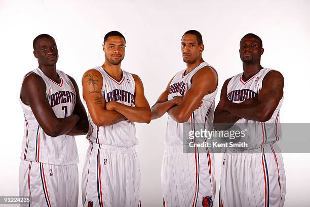 DeSagana Diop, Tyson Chandler, Alexis Alinca and Nazr Mohammed of the Charlotte Bobcats pose for a portrait during 2009 NBA Media Day on September...