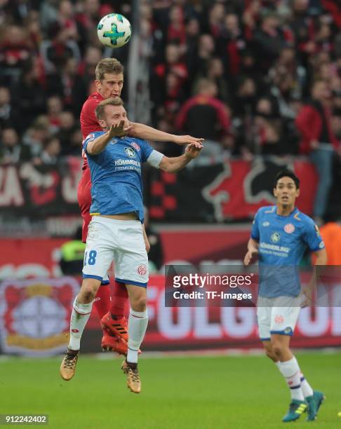 Lars Bender of Leverkusen and Daniel Brosinski of Mainz battle for the ball during the Bundesliga match between Bayer 04 Leverkusen and 1. FSV Mainz...