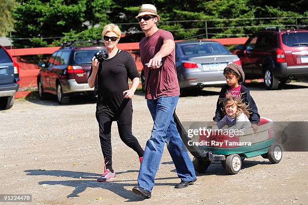 Actors Deborra-Lee Furness, Hugh Jackman and their children Ava Jackman, and Oscar Jackman visit the Silverman Farm on September 28, 2009 in Easton,...