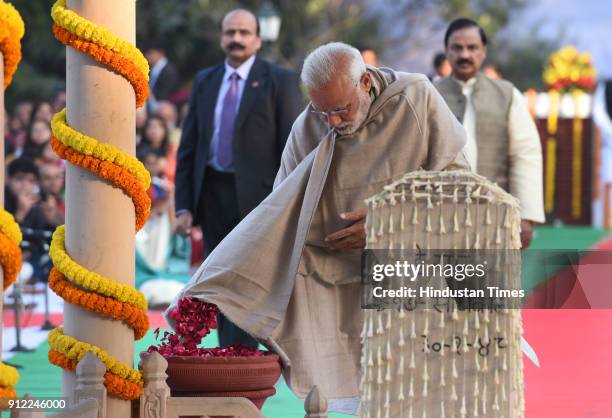 Prime Minister Narendra Modi pays homage to Mahatma Gandhi, on his 70th death anniversary, also observed as Martyrs' Day, at Gandhi Smriti, on...