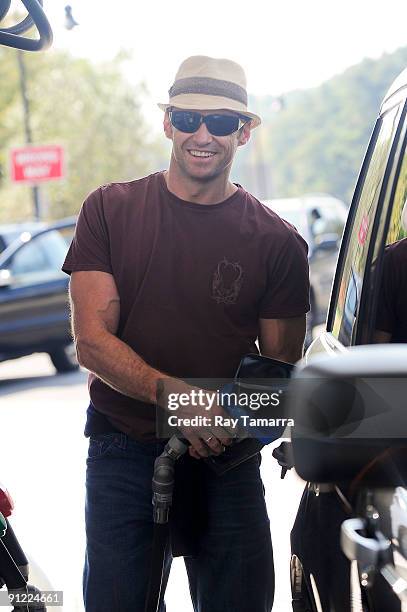 Actor Hugh Jackman gets gas at a Mobil Gas Station on September 28, 2009 in Easton, Connecticut.