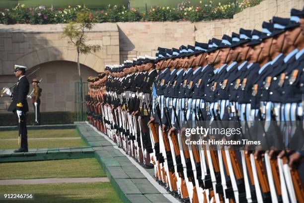 Soldiers pay homage to Mahatma Gandhi on his 70th death anniversary, also observed as Martyr's day at Rajghat, on January 30, 2018 in New Delhi,...