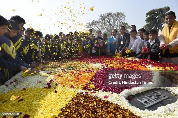 Children gather around Rajghat to pay homage to Mahatma Gandhi on his 70th death anniversary, also observed as Martyrs' Day on January 30, 2018 in...